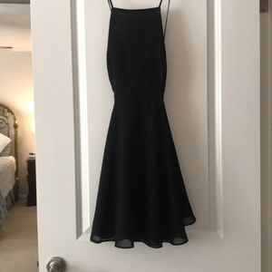 flowy open back black dress